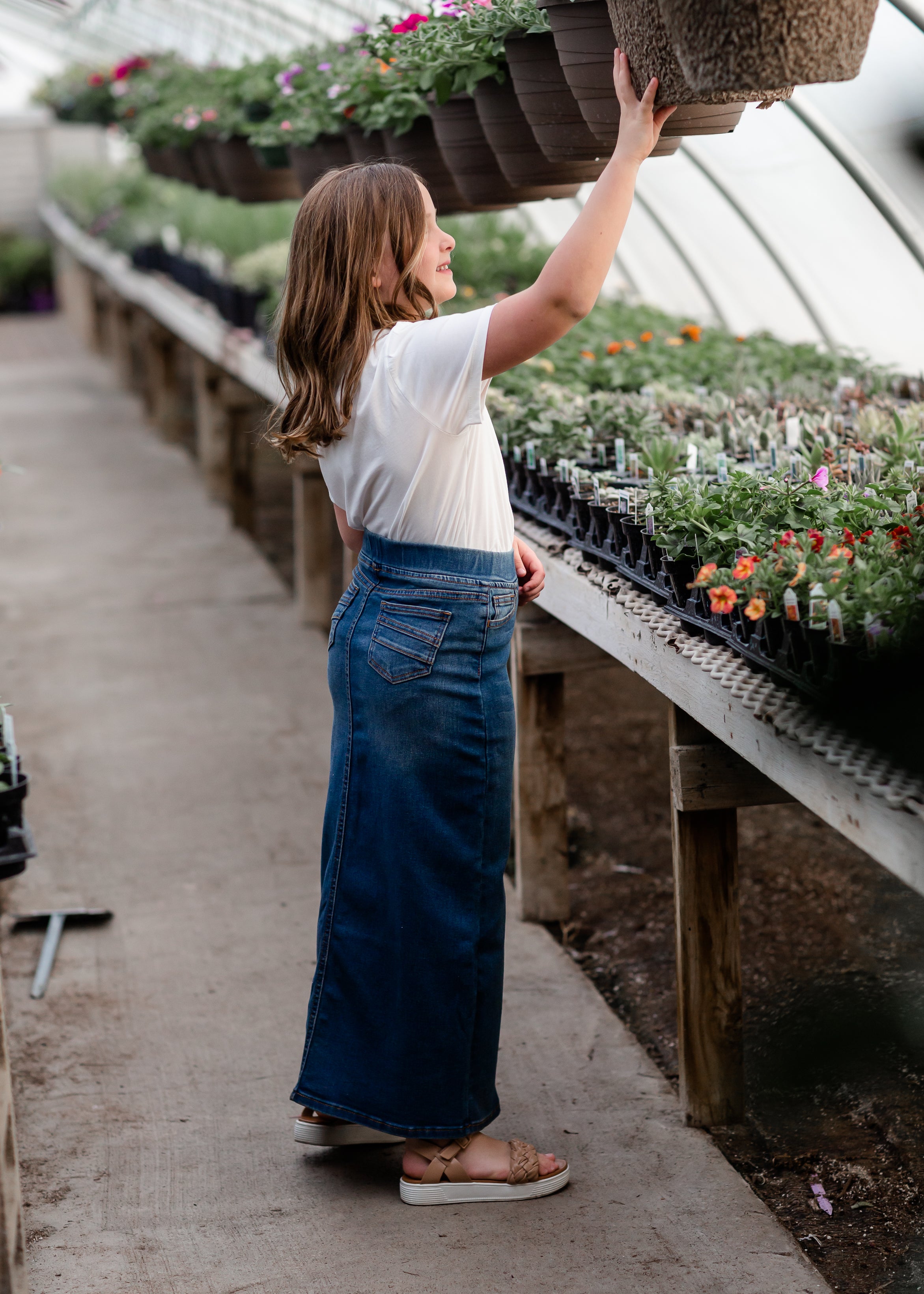 Girl wearing maxi outlet skirt