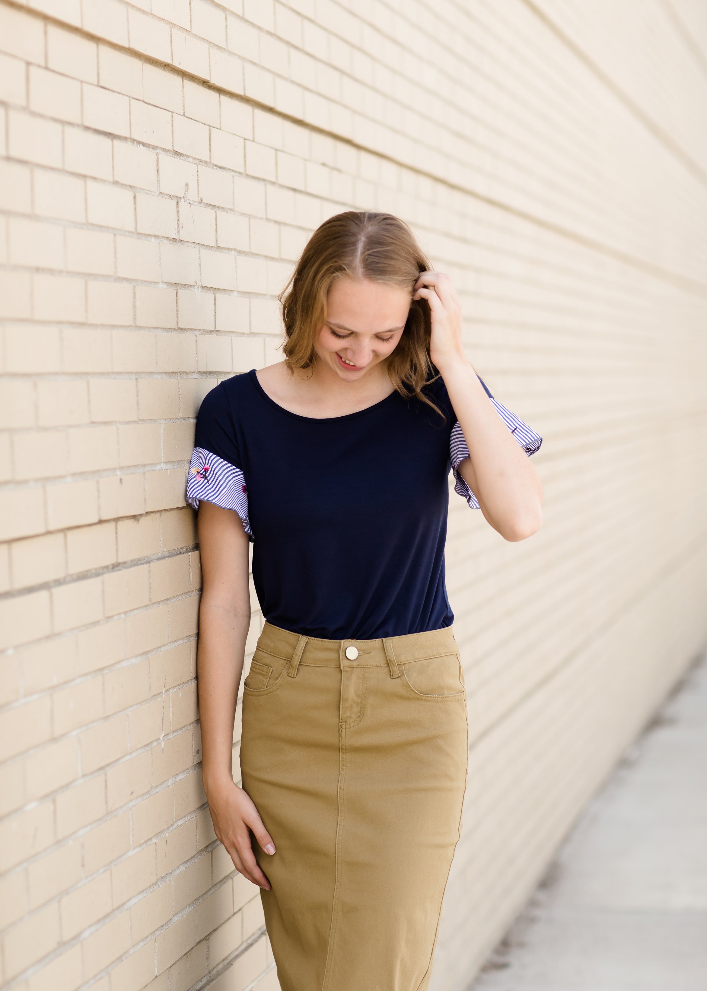 Khaki pencil skirt with belt outlet loops